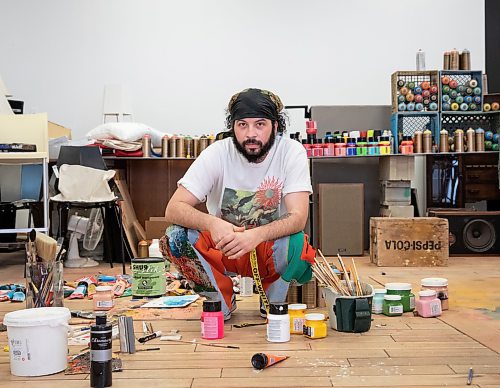 JESSICA LEE / WINNIPEG FREE PRESS

Winnipeg artist Bistyek poses for a photo at his studio space on March 31, 2022.