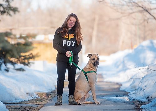 Mike Sudoma / Winnipeg Free Press
Sara Anema and her pup Finley share moment while on a walk Thursday evening. Sara volunteers her time managing the Winnipeg Branch of the Animal Food Bank.
March 31, 2022