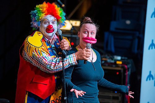 Doodles the Clown pulls Allison Curle on stage at the Manitoba Hydro Auditorium Thursday. (Chelsea Kemp/The Brandon Sun)