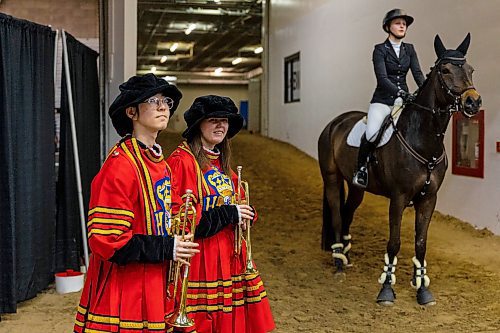 Buglers Joseph Hur and Jacqueline Oertel prepare to announce a competitor at the ATCO Cup at the Royal Manitoba Winter Fair Thursday at Westoba Place. (Chelsea Kemp/The Brandon Sun)