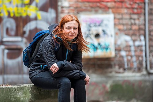 MIKAELA MACKENZIE / WINNIPEG FREE PRESS

Ukrainian refugee Tetiana Maksymtsiv poses for a portrait outside of her place in Warsaw on Thursday, March 31, 2022.  Her mother's Polish employer helped her arrange the flat, and in a few days she will be flying to Winnipeg to settle in Canada. For Melissa story.
Winnipeg Free Press 2022.