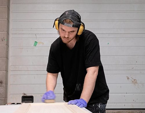 JESSICA LEE / WINNIPEG FREE PRESS
Justin Steer of Western Paint, is photographed sanding furniture parts on April 4, 2022.
Reporter: Dave