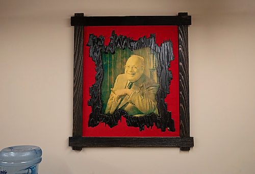 JESSICA LEE / WINNIPEG FREE PRESS
A portrait of Paul Schimnowski’s father hangs upstairs in the offices next to a water cooler.
Reporter: Dave