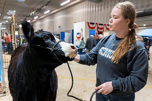 Brooklyn Hedley from Rapid City attends the Royal Manitoba Winter Fair showing livestock Friday. (Chelsea Kemp/The Brandon Sun)