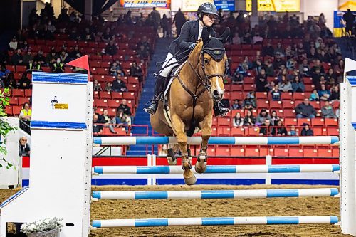 Femke Courchaine and Jalapeno BF compete in the RBC Challenge Friday at the Westoba Place Main Arena. (Chelsea Kemp/The Brandon Sun)