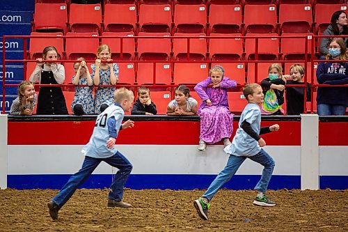 Jamie 9 and Weston 10 Murray race in the Barn Yard Obstacle Course at the Royal Manitoba Winter Fair Thursday at Westoba Place. (Chelsea Kemp/The Brandon Sun)