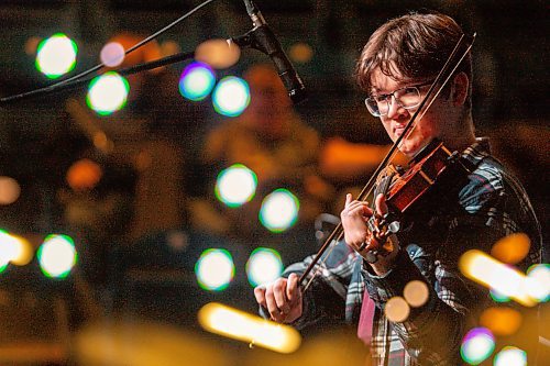 A multiple exposure photos captures a performer on stage for the 47th Annual Royal Fiddlers&#x2019; Contest in the Manitoba Hydro Auditorium at the Keystone Centre during the Royal Manitoba Winter Fair Wednesday, (Chelsea Kemp/The Brandon Sun)
