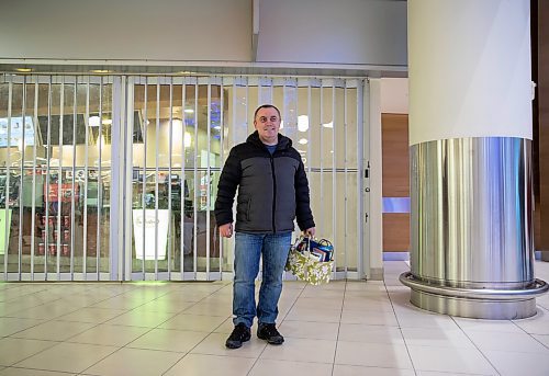 JESSICA LEE / WINNIPEG FREE PRESS

Dmytro Malyk, a volunteer with the Ukrainian Canadian Congress, waits at the airport on April 6, 2022 for Tetiana Maksymtsiv, a Ukrainian refugee. He holds a welcome basket another volunteer prepared.

Reporter: Katlyn