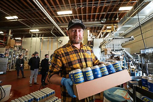 RUTH BONNEVILLE / WINNIPEG FREE PRESS

ENT - beer for Ukraine

Matthew Wolff (cap), Operations Manager at Torque Brewing, along with Kyle Maskiiw canning operator, are thrilled to start production of Ukraine Brew Friday.. Three thousand cans of the unique recipe will be produced with proceeds going to the Ukraine Crisis.  

Subject: Eight local craft breweries in Winnipeg are collaborating on a beer, with all proceeds going to a humanitarian relief fund in Ukraine. The beer recipe is from Pravda Brewing, a Ukrainian brewery based in Lviv.

The breweries collaborating are: Torque Brewing, Trans Canada Brewing, Nonsuch Brewing, Barn Hammer Brewing, One Great City Brewing, Devil May Care Brewing, Lake of the Woods Brewing, and Stone Angel Brewing.

Eva Wasney



April 8th,  2022
