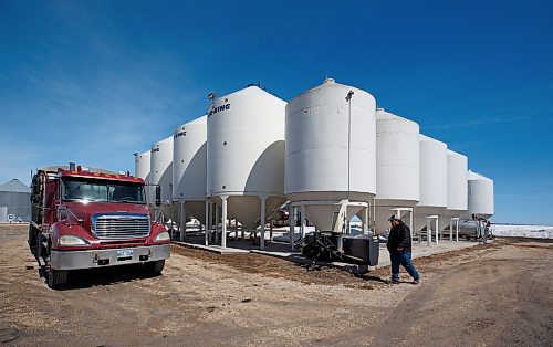 MIKE DEAL / WINNIPEG FREE PRESS
Farmer, Chuck Fossay, inspects various bins on his property about 20 miles west of Winnipeg Friday afternoon. 
Farmers are starting to plan out what to plant this year in light of all the disruptions in the market -- including the war in Ukraine -- that have driven prices up significantly in many commodities.
See Martin Cash story
220408 - Friday, April 08, 2022.