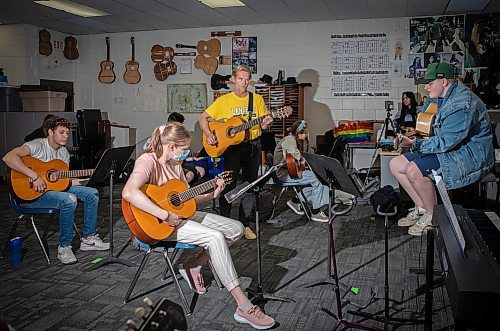 JESSICA LEE / WINNIPEG FREE PRESS

Ric Schulz (in yellow) is a long-time guitar teacher and champion for expanding music education across Manitoba schools. He is photographed in his classroom at Dakota Collegiate during class on June 3, 2022.

Reporter: Maggie Macintosh


