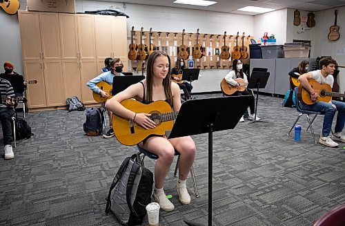 JESSICA LEE / WINNIPEG FREE PRESS

Torrance St. Laurent is photographed during guitar class taught by Ric Schulz on June 3, 2022. Schulz is a long-time guitar teacher at Dakota Collegiate and champion for expanding music education across Manitoba schools. 

Reporter: Maggie Macintosh



