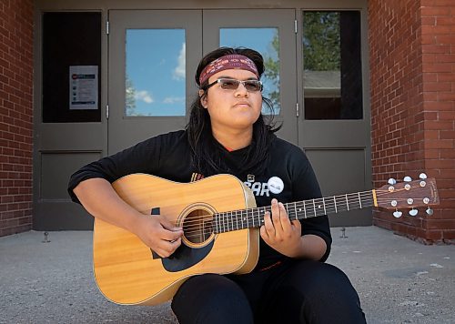 JESSICA LEE / WINNIPEG FREE PRESS

Denzel Bird is a grade 12 student in Ric Schulz&#x2019;s guitar class. He is photographed on June 3, 2022 at Dakota Collegiate. Ric Schulz is a long-time guitar teacher and champion for expanding music education across Manitoba schools. 

Reporter: Maggie Macintosh



