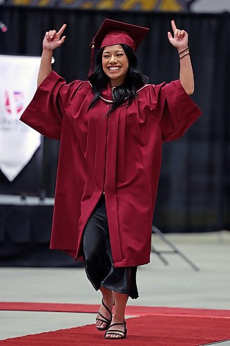 03062022
Jenica Joy Madrid celebrates while walking up to receive her diploma in Practical Nursing during Assiniboine Community College&#x2019;s 2022 graduation ceremony at Westoba Place on Friday. 
(Tim Smith/The Brandon Sun)