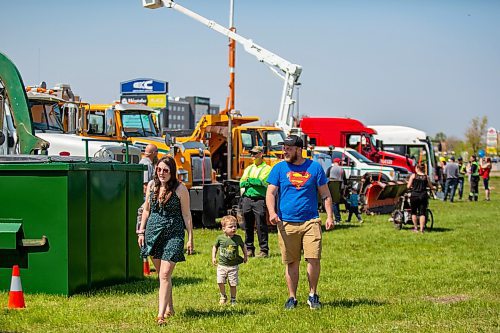 Guests explore big rigs during Touch-a-Truck at the Keystone Centre grounds Saturday. (Chelsea Kemp/The Brandon Sun)