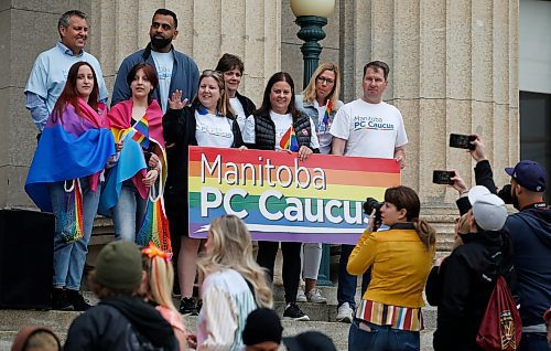 JOHN WOODS / WINNIPEG FREE PRESS
Manitoba premier Heather Stefanson, centre, is photographed with some of her caucus at the Pride rally in downtown Winnipeg Sunday, June 5, 2022. 

Re: gabby