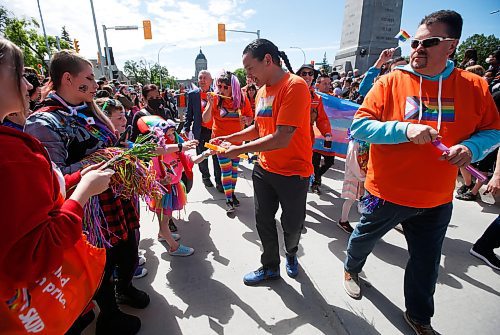 JOHN WOODS / WINNIPEG FREE PRESS
NDP leader Wab Kinew takes part in the Pride Parade in downtown Winnipeg Sunday, June 5, 2022. 

Re: gabby