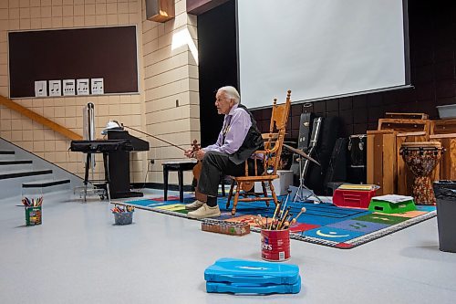 ETHAN CAIRNS / WINNIPEG FREE PRESS
Elder Winston holds a violin in the music room of A. E. Wright School in Winnipeg, Manitoba on Monday June 6, 2022. The school is putting on what's believed to be the first Cree School Musical.