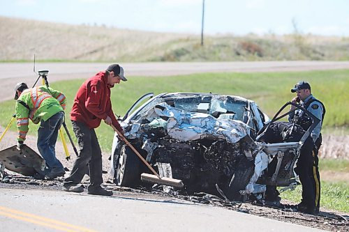 06062022
RCMP officers and tow truck operators work at the scene of a serious two-vehicle-collision on Highway 10 south of Erickson, Manitoba on Monday morning. STARS Air Ambulance responded to the scene of the collision and transported a male in critical condition to Winnipeg. 
(The Brandon Sun)