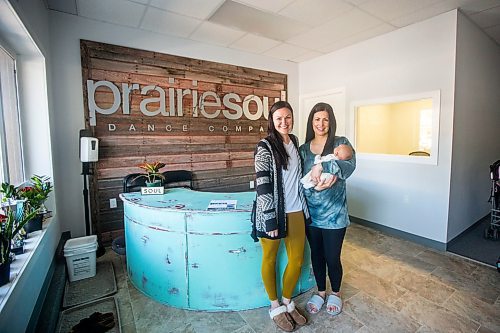 MIKAELA MACKENZIE / WINNIPEG FREE PRESS

Danielle Auld (left) and Melanie Ducharme (with baby Gus Jaotter), co-owners of Prairie Soul Dance Company, pose for a portrait in their studio in Niverville on Monday, June 6, 2022.  For Gabby story.
Winnipeg Free Press 2022.