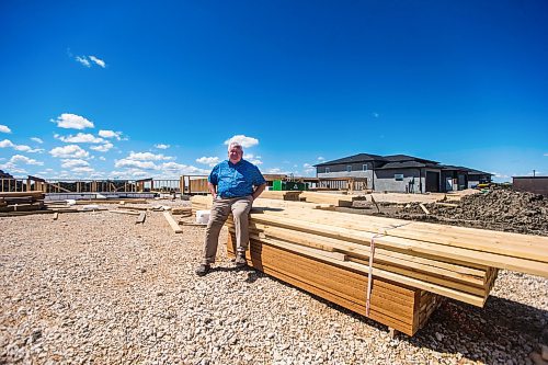 MIKAELA MACKENZIE / WINNIPEG FREE PRESS

Clarence Braun, realtor with Keller Williams Real Estate Services, poses for a portrait in a new development he's sold in Niverville on Monday, June 6, 2022.  For Gabby story.
Winnipeg Free Press 2022.