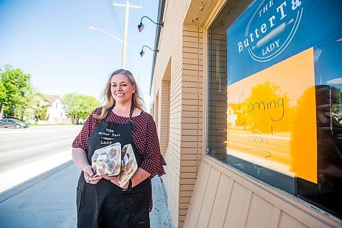 MIKAELA MACKENZIE / WINNIPEG FREE PRESS

Michelle Wierda, owner of The Butter Tart Lady, poses for a portrait outside of her new space on Ness in Winnipeg on Tuesday, June 7, 2022.  For Gabby story.
Winnipeg Free Press 2022.