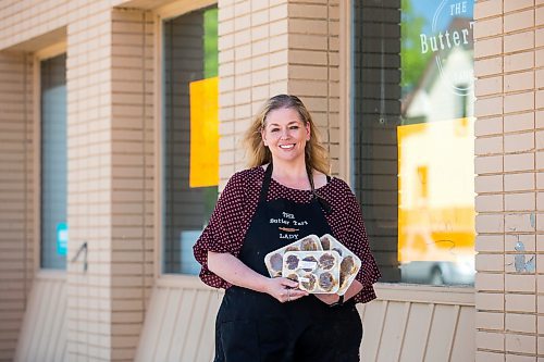 MIKAELA MACKENZIE / WINNIPEG FREE PRESS

Michelle Wierda, owner of The Butter Tart Lady, poses for a portrait outside of her new space on Ness in Winnipeg on Tuesday, June 7, 2022.  For Gabby story.
Winnipeg Free Press 2022.
