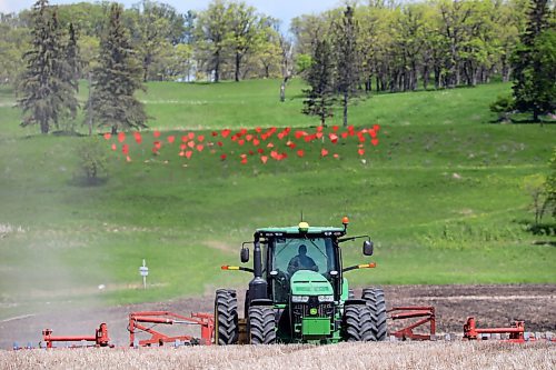 07062022
a farmer works in a field along Grand Valley Road west of Brandon on Tuesday. (Tim Smith/The Brandon Sun)