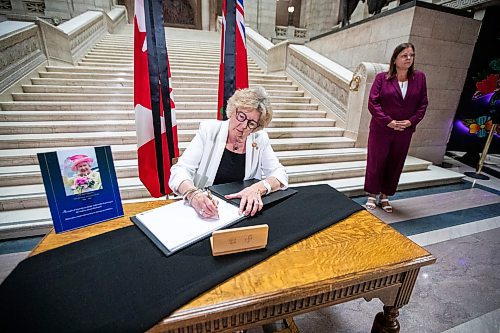 Daniel Crump / Winnipeg Free Press. Lt.-Gov. Janice Filmon signs the book of condolences commemorating Queen Elizabeth II at the Manitoba legislature in Winnipeg. September 8, 2022.