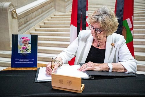 Daniel Crump / Winnipeg Free Press. Lt.-Gov. Janice Filmon signs the book of condolences commemorating Queen Elizabeth II at the Manitoba legislature in Winnipeg. September 8, 2022.