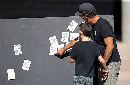 JOHN WOODS / WINNIPEG FREE PRESS
People look at a &#x201c;Wishing Wall&#x201d; at a People For Public Education picnic at the Forks Sunday, September 11, 2022. 

Re: