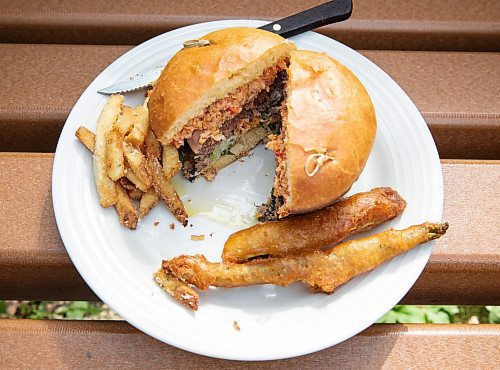 JESSICA LEE / WINNIPEG FREE PRESS

The burger for Le Burger Week from 529 Wellington Steakhouse is photographed on September 12, 2022. The burger includes fries and deep fried pickle and deep fried asparagus.

Reporters: AV Kitching and Ben Waldman