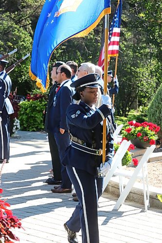 A member of the Minot Air Force Base Honor Guard takes part in a flag presentation during Sunday's 9/11 memorial event at the International Peace Garden. (Kyle Darbyson/The Brandon Sun) 