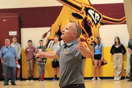 Principal Chad Cobbe welcomes an incoming group of Grade 9 students to Crocus Plains Regional Secondary School on Wednesday afternoon. (Kyle Darbyson/The Brandon Sun)