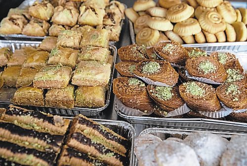JESSICA LEE / WINNIPEG FREE PRESS

A variety of baklava (left) and MaaMoul (shortbread cookie) at Baraka Bakery on November 10, 2021.