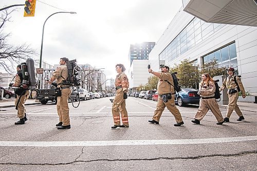 Mike Sudoma / Winnipeg Free Press
The Ghost Busters of Winnipeg take a break from their booth at Comic Con and walk down York Avenue Saturday afternoon
October 30, 2021