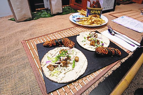 Mike Sudoma / Winnipeg Free Press

A freshly served dish of Sisig Taco and Mochiko Chicken at Barn Manila Nights Wednesday evening

November 10, 2021