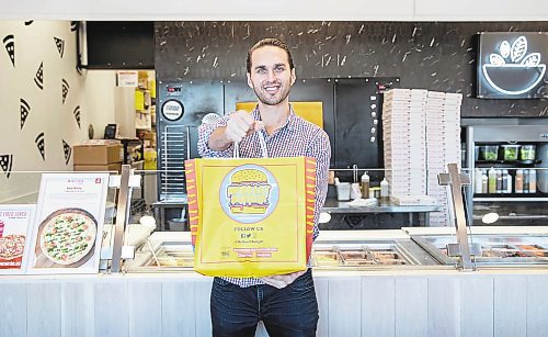 JESSICA LEE / WINNIPEG FREE PRESS



Benjamin Nasberg, president and CEO of Carbone Restaurant Group, is photographed on November 9, 2021, at Carbone FAST FIRED. He holds a MrBeast Burger order, which operates out of the Carbone FAST FIRED kitchen.



Reporter: Gabby