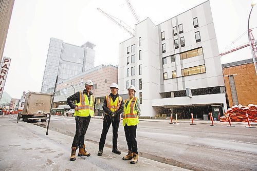 MIKE DEAL / WINNIPEG FREE PRESS

School Director, St&#xe9;phane L&#xe9;onard (left), Practice Leader at Architecture49 Inc., Michael Conway (centre) and School Managing Director, Kate Fennell (right) outside the new building at 225 Edmonton Street.

The RWB student boarding building at 225 Edmonton Street that is under construction replacing the accommodations that were torn down to make way for the completion of True North Square and the new Wawanesa head office. 

see Jen Zoratti story

211110 - Wednesday, November 10, 2021.