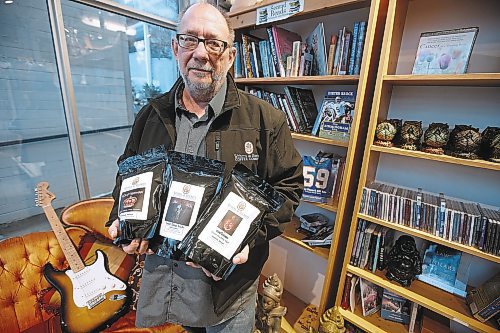 JOHN WOODS / WINNIPEG FREE PRESS

Robert Young, owner of Writers &amp; Rockers Coffee Company, shows off some of his labels at Radiance Gifts in Winnipeg on Tuesday, November 16, 2021. Young has partnered with some canadian bands and sells his products at Radiance Gifts.



Re: ?