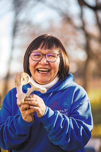 MIKAELA MACKENZIE / WINNIPEG FREE PRESS



Inuit carver Goota Ashoona, who comes from a long line of artists and whose scupture lives outside of Qaumajuq, poses for a portrait with a newly finished whalebone carving in her yard near Elie on Tuesday, Nov. 9, 2021. For Jen story.

Winnipeg Free Press 2021.