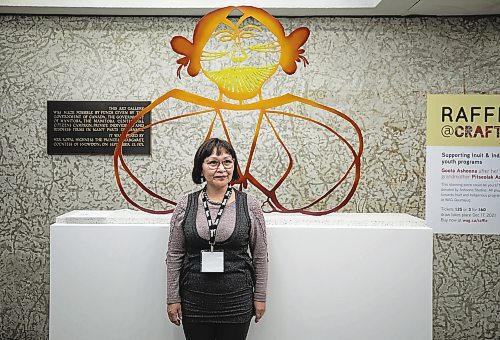 JESSICA LEE / WINNIPEG FREE PRESS



Artist Goota Ashoona poses in front of a sculpture she made which is based on a drawing her grandmother created is displayed at WAG on November 5, 2021.



Reporter: Jen