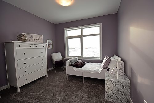 Todd Lewys / Winnipeg Free Press
Windows on the rear wall add light and character to both secondary bedrooms, which are set well away from the primary bedroom.