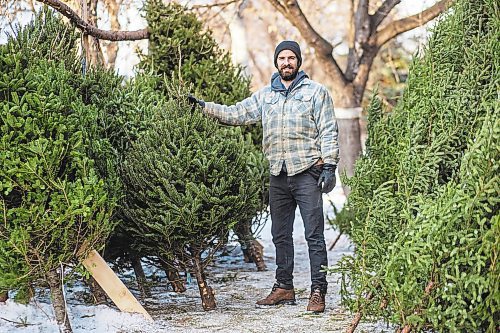 MIKAELA MACKENZIE / WINNIPEG FREE PRESS



Robin Bryan poses for a portrait with Christmas trees at Pete's Trees in Winnipeg on Friday, Dec. 3, 2021. For Martin Cash story.

Winnipeg Free Press 2021.