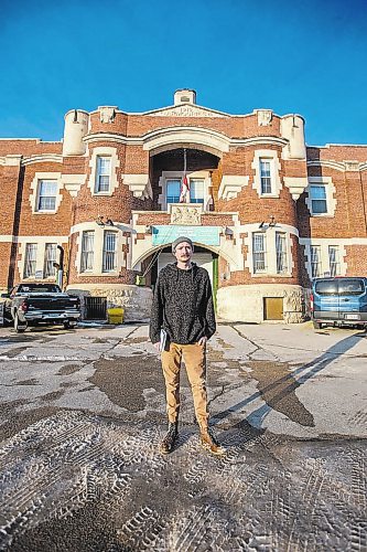 MIKAELA MACKENZIE / WINNIPEG FREE PRESS



Free Press reporter Ryan Thorpe poses for a portrait in front of the Minto Armoury, where Patrik Mathews was at one point stationed, in Winnipeg on Friday, Nov. 19, 2021. For Ryan Thorpe story.

Winnipeg Free Press 2021.