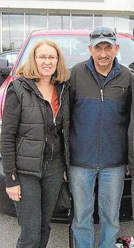 Brandon Sun Betty Hughes and Robert Hughes seen here on the day the couple picked up a Chevrolet Silverado from a dealer in Portage la Prairie in 2011. (Facebook)