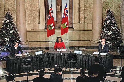 Daniel Crump / Winnipeg Free Press. (L to R) Dr. Peter MacDonald, chair, Diagnostic and Surgical Recovery Task Force Steering Committee, Health and Seniors Care Minister Audrey Gordon, Matthew Lister, project team director, Diagnostic and Surgical Recovery Task Force speak at an announcement in the rotunda at the Manitoba legislative building in Winnipeg. December 8, 2021.