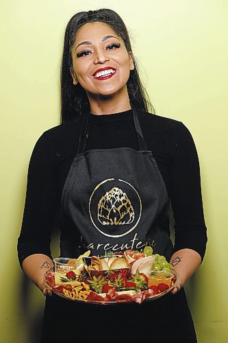 JOHN WOODS / WINNIPEG FREE PRESS

Cassandra Carreiro, a registered psychiatric nurse who has started a side business called Sharecuterie which prepares and delivers charcuterie boards, is photographed in her work kitchen in Winnipeg Tuesday, March 2, 2021. 



Reporter: Sanderson