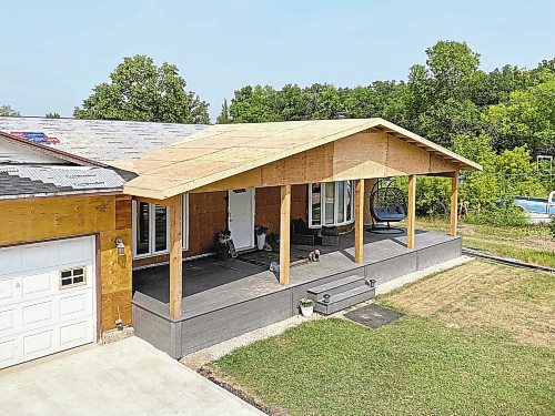 Marc LaBossiere / Winnipeg Free Press
Once the new trusses were in place, the entire structure was sheeted with plywood and the inner fir posts were positioned. 
