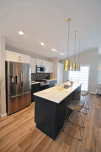 Todd Lewys / Winnipeg Free Press

A nine-foot island and plenty of prep space at either end make this kitchen perfect for creating and entertaining. 